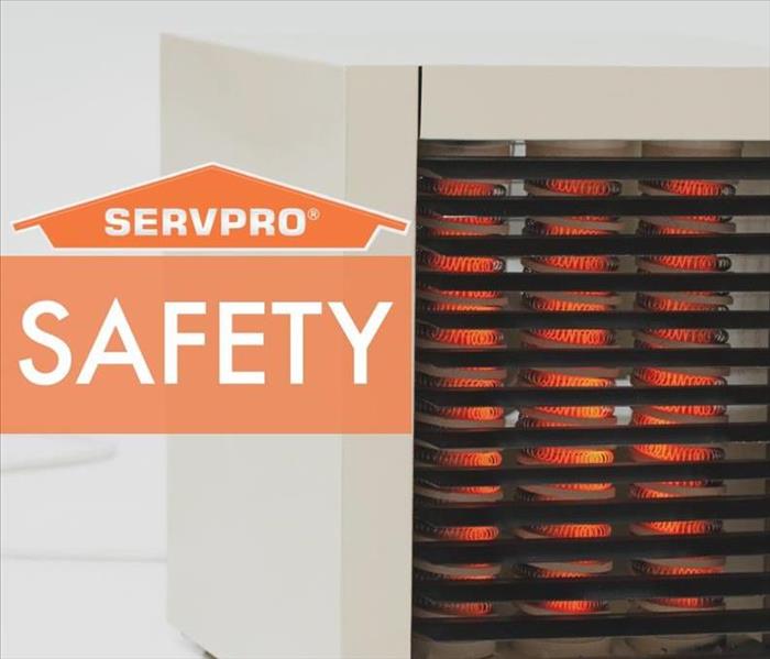 Image of a space heater with a banner that says "SERVPRO Safety"