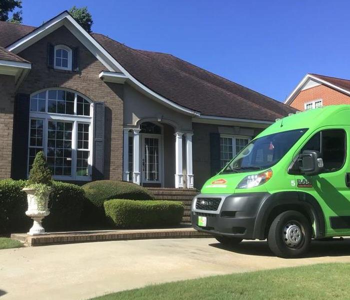 Green SERVPRO van outside of residential home in Columbia County, GA